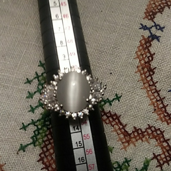 Moonstone with white topaz accents.